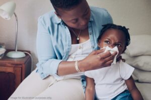 Pfizer Mom and Baby Blowing Nose - 1